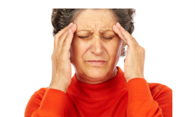 Senior woman with headache