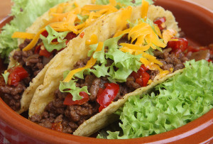 Mexican beef tacos in pottery serving dish