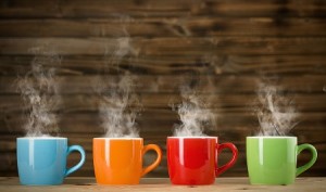 cups with steaming drinkthe cups with steaming drink