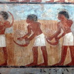 Ancient Egyptian mural depicting 6 workers harvesting Khorasan wheat
