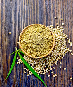 Flour Hemp In Spoon With Leaf On Board