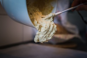 swg bread dough being poured from the bowl