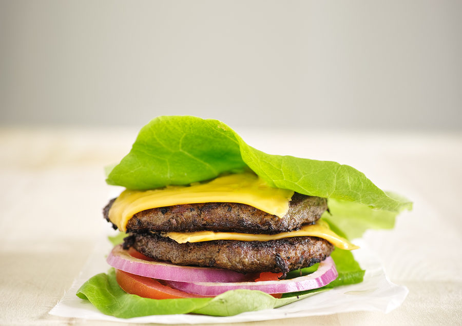 Keto cheeseburger wrapped in lettuce